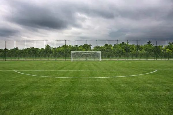 How did the football pitch end up as a triangle?