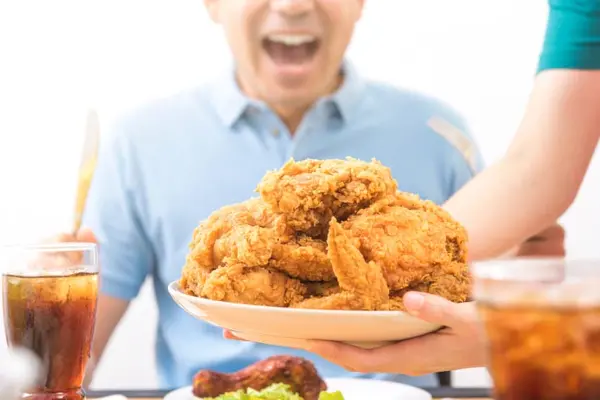 What's the name of the winner of the chicken-eating contest?