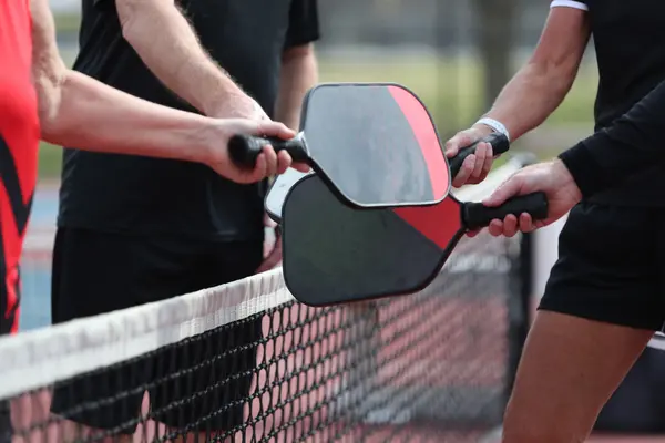What's the difference between pickleball and tennis?